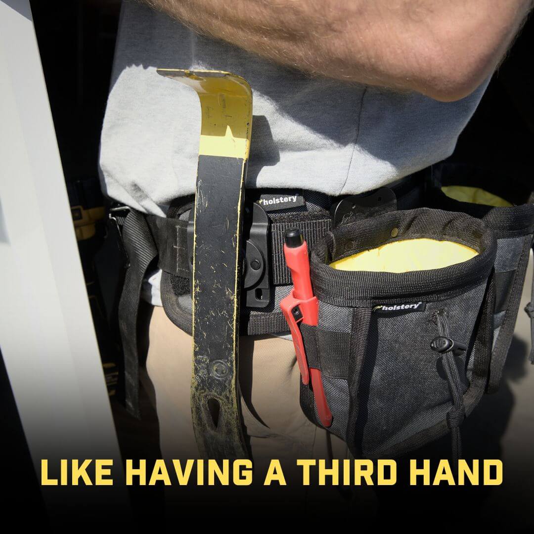 Magnetic belt holder in use on a work belt